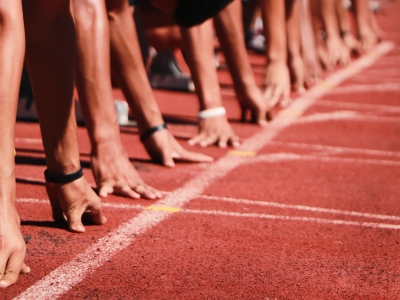 Athletes lined up at start line of track and field race