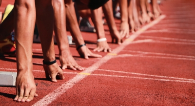 Athletes lined up at start line of track and field race