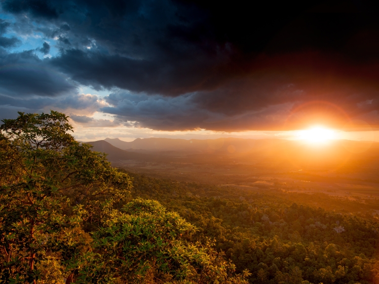 Image of sunset with storm clouds from Mount French, Queensland.